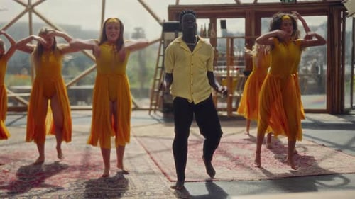 Dancers Perform Together in an Urban Indoor Space