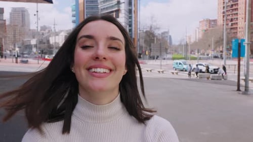 Portrait of Young Happy Attractive Woman Smiling at Camera Standing at City
