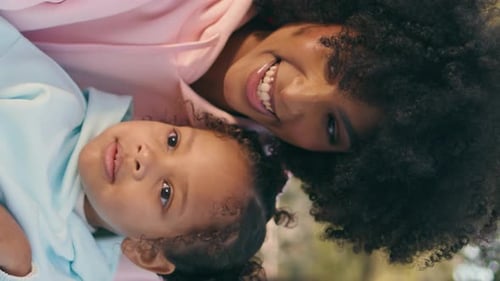 Mother Making Phone Selfie with Daughter at Park Closeup Girls Smiling Vertical