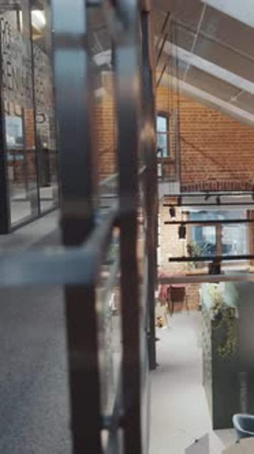 Vertical of Loft Interior of Modern Two-Story Open Space Office Building