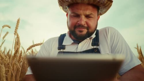 Farmer with Tablet in Agricultural Field Portrait of Professional Agronomist Agronomy and