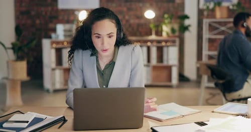 Laptop, call center consulting or woman speaking or talking in communications company office