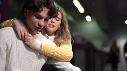 Affectionate Couple Embracing Intimately in City Setting