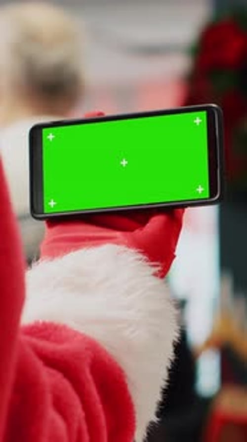 Vertical Video Santa Holding Chroma Key Smartphone