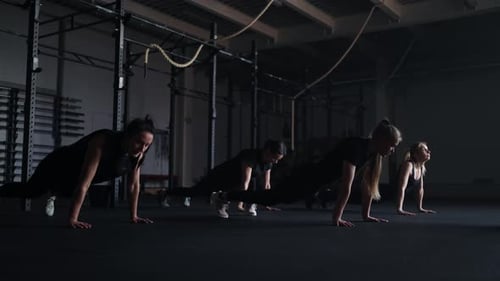 Beautiful Young Women Training In Fitness Center Aerobics Workout In Gym Sport Activities