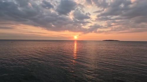 Beautiful timelapse of sunset or sunrise view over sea surface beautiful wave.