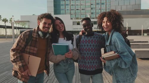 Smiling Students Outdoors on University Campus