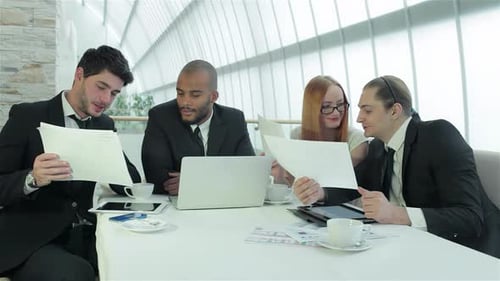 Young Professionals Working Together in Modern Office