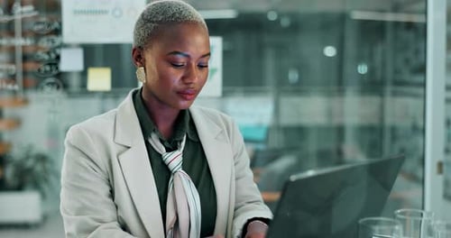 African woman, yawn and tired in office with laptop, reading and exhausted with fatigue at financial
