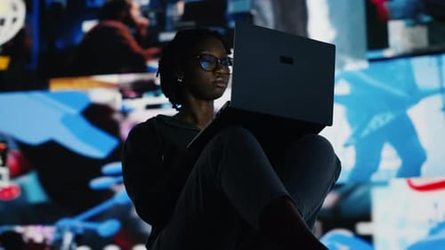 Woman Staring at Laptop Screen Feeling Tired While Doing Homework