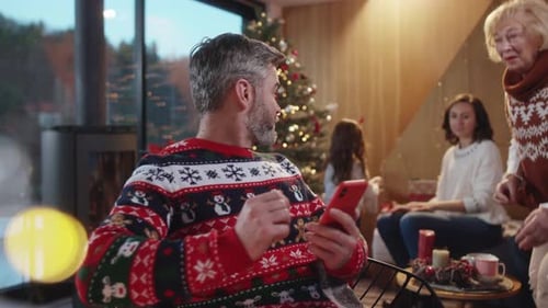 Family Gathers at Home for Cozy Christmas Moments