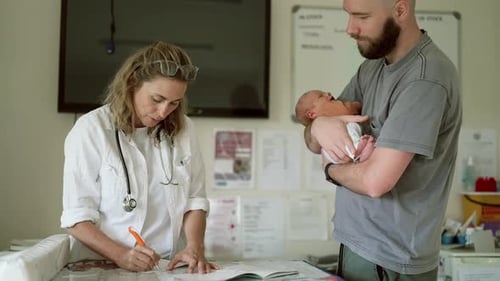 Doctor, baby and father with woman writing in hospital for healthcare service, check up or wellness