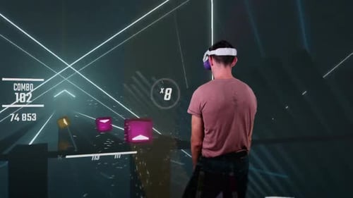 Man Plays Futuristic Virtual Reality Saber Game