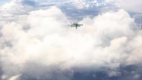 Military Jet Flying Through a Sea of Clouds
