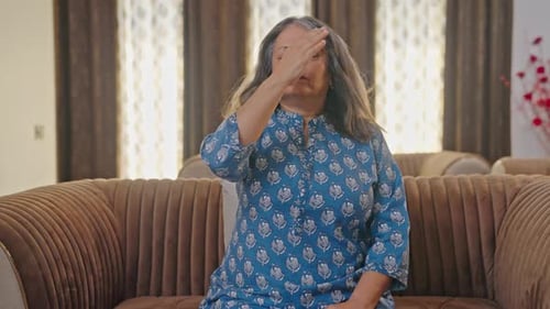 Woman Practices Alternate Nostril Breathing Yoga Technique