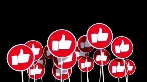 Collection of thumbs up signs on sticks