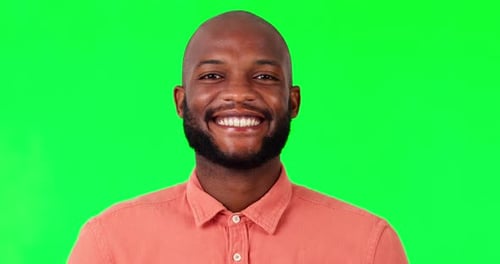 Happy, smile and man in studio with green screen for advertising, promotion or marketing