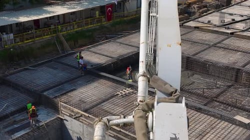 Aerial View HighRise Residential Building Under Construction Workers Working Hard