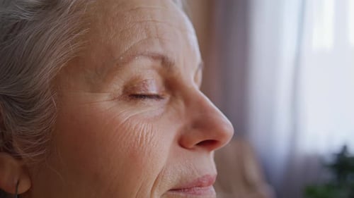 Senior Woman's Detailed Face in Close-Up Profile