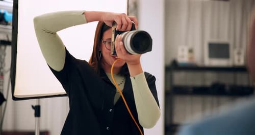 Photographer, camera and photoshoot in studio for production, media and magazine cover as creative