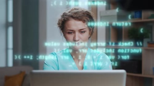 Successful Woman Working on Program Code at Laptop Computer in Home Office Room