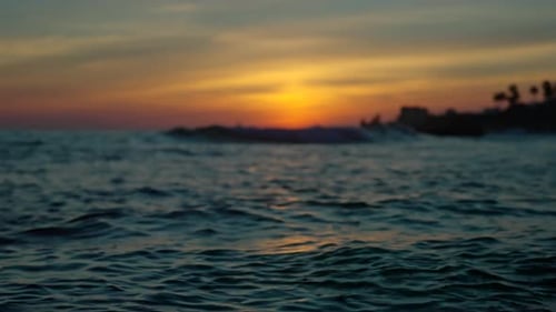 Ocean sunset with defocused background