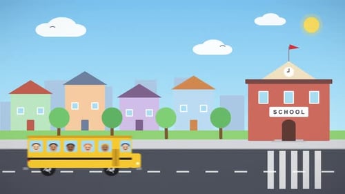 Yellow School Bus Driving Through Town to School for the Beginning of Lessons