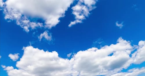 White Clouds Drifting Across a Blue Sky