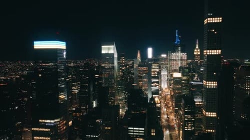 Skyscrapers Finance District Aerial Flight Over NYC Downtown Illuminated Night