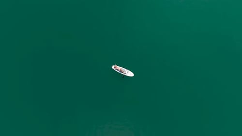 Aerial View Journey on Paddleboards Through the Green Canyon People Enjoying the Summer Sun