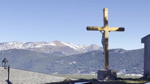Wooden Cross With Snow-Capped Mountain Background