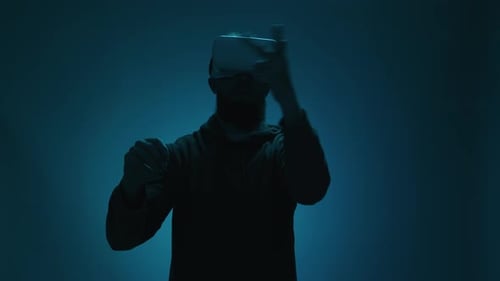 Man Immersed in Virtual Reality Headset