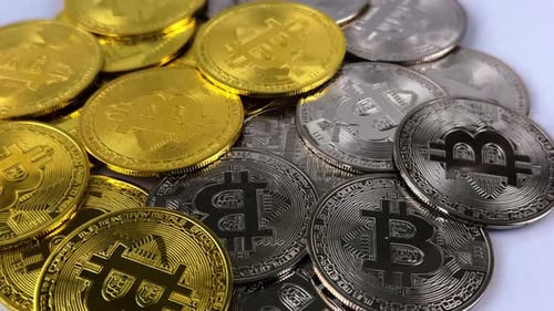 Pile of Gold and Silver Bitcoin Cryptocurrency Coins