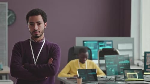 Portrait of Middle Eastern Software Developer in Office
