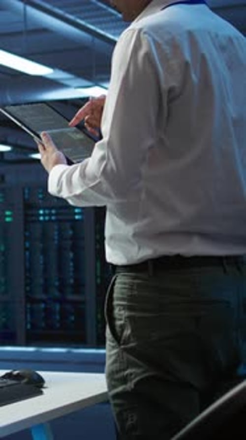 Server Room Professional Reviews Data on Tablet