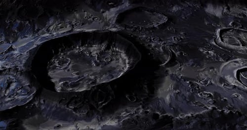 Dark Lunar Landscape with Craters and Surface Details Illuminated By Light