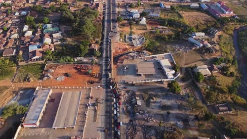 Stunning aerial of a traffic gridlock in Abuja, Nigeria during morning commute on a sunny day