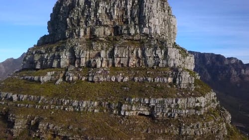 Ascending to the Peak of the Majestic Lions Head Mountain as a bird flies past, Sea Point, Cape Town