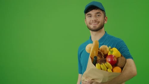 Green Screen Delivery Man Brings Paper Bag with Food