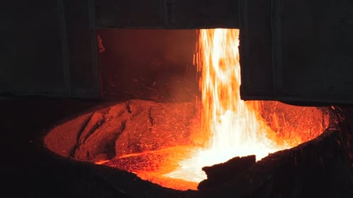 Liquid Steel Pouring Into Vessel Swiftly Bright Molten Stream Cascading Into Steel Ladle Rapidly