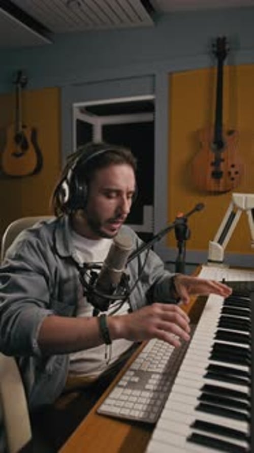 Musician Recording Music at Music Recording Studio