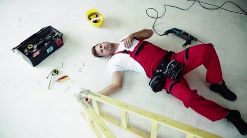 Top View of an Accident of a Man Worker at the Construction