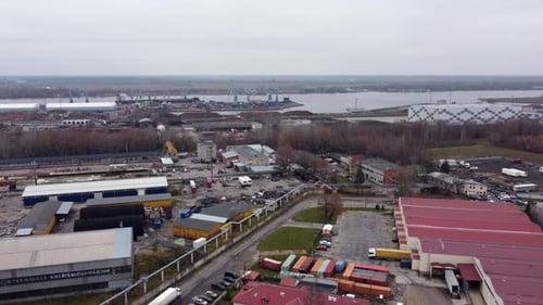 Aerial cityscape of an Industrial port town of Andrejsala in Latvia, city transport, traffic and con