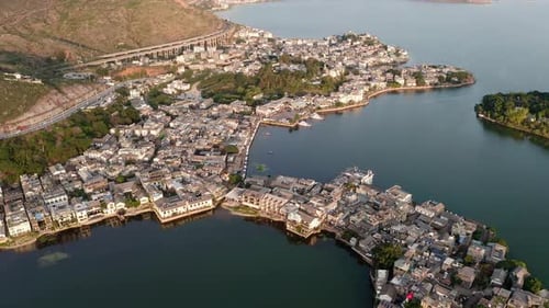 Village and lake in Shuanglang, Yunnan, China