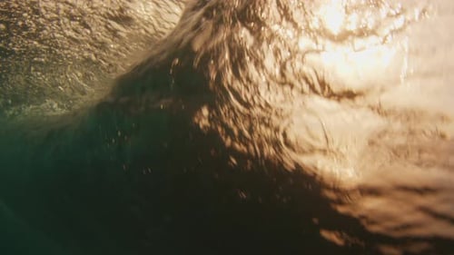 Underwater view of the breaking wave in the Maldives