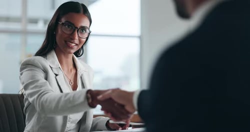 Woman in Business Meeting Speaking and Shaking Hands