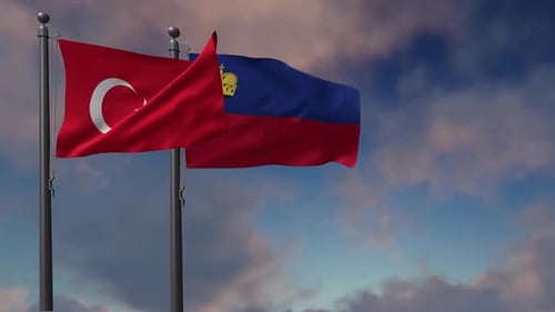 Turkey and Liechtenstein Flags Waving Against Blue Sky