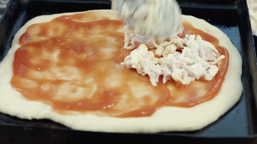 Preparing Delicious Homemade Pizza with Toppings