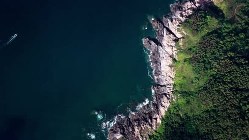 Aerial Top view of a transparent blue sea with beautiful waves at sunny day in summer. air of ocean