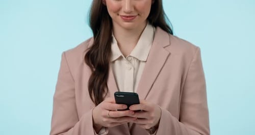 Phone, closeup and businesswoman in a studio typing a text message or networking on social media